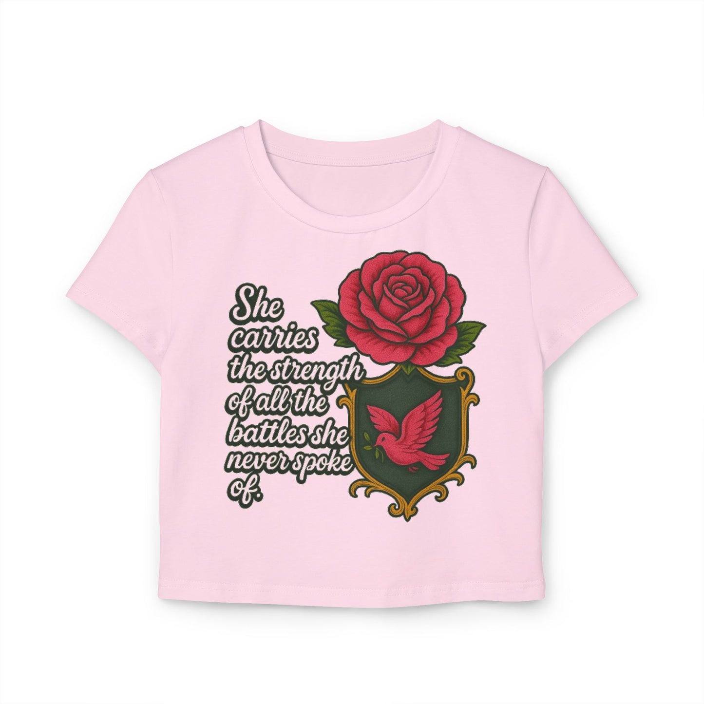 SHE CARRIES THE STRENGTH OF ALL THE BATTLES SHE NEVER SPOKE OF Women's Baby Tee