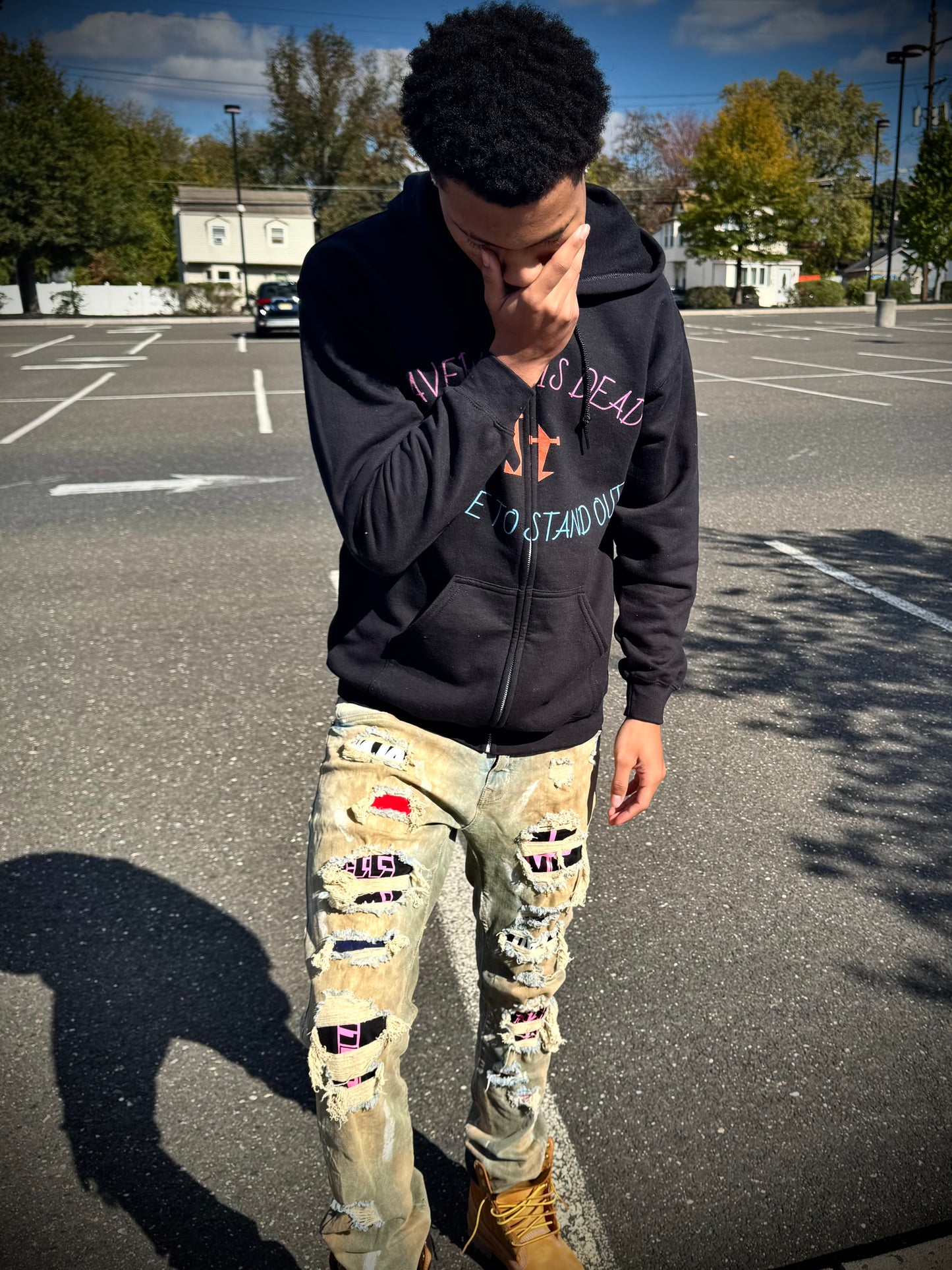 Jt Apparel "Average Is Dead, Made To Stand Out" Multi Color Cross Eyes Emoji Design Zip Up